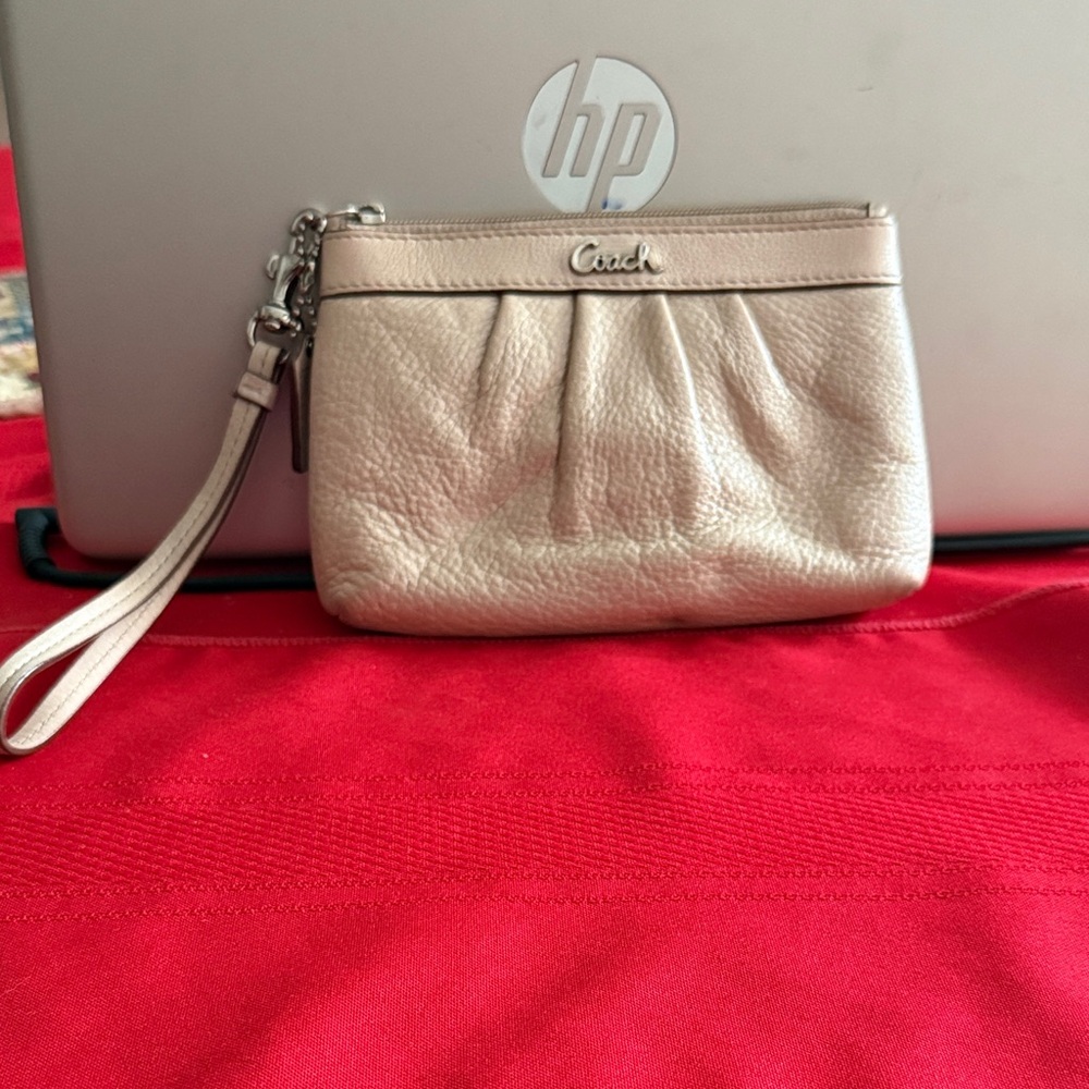 Coach Metallic Cream Wristlet Clutch. Very good condition.
